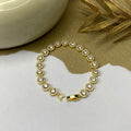 Golden Tennis Bracelet with Solitaire Stones