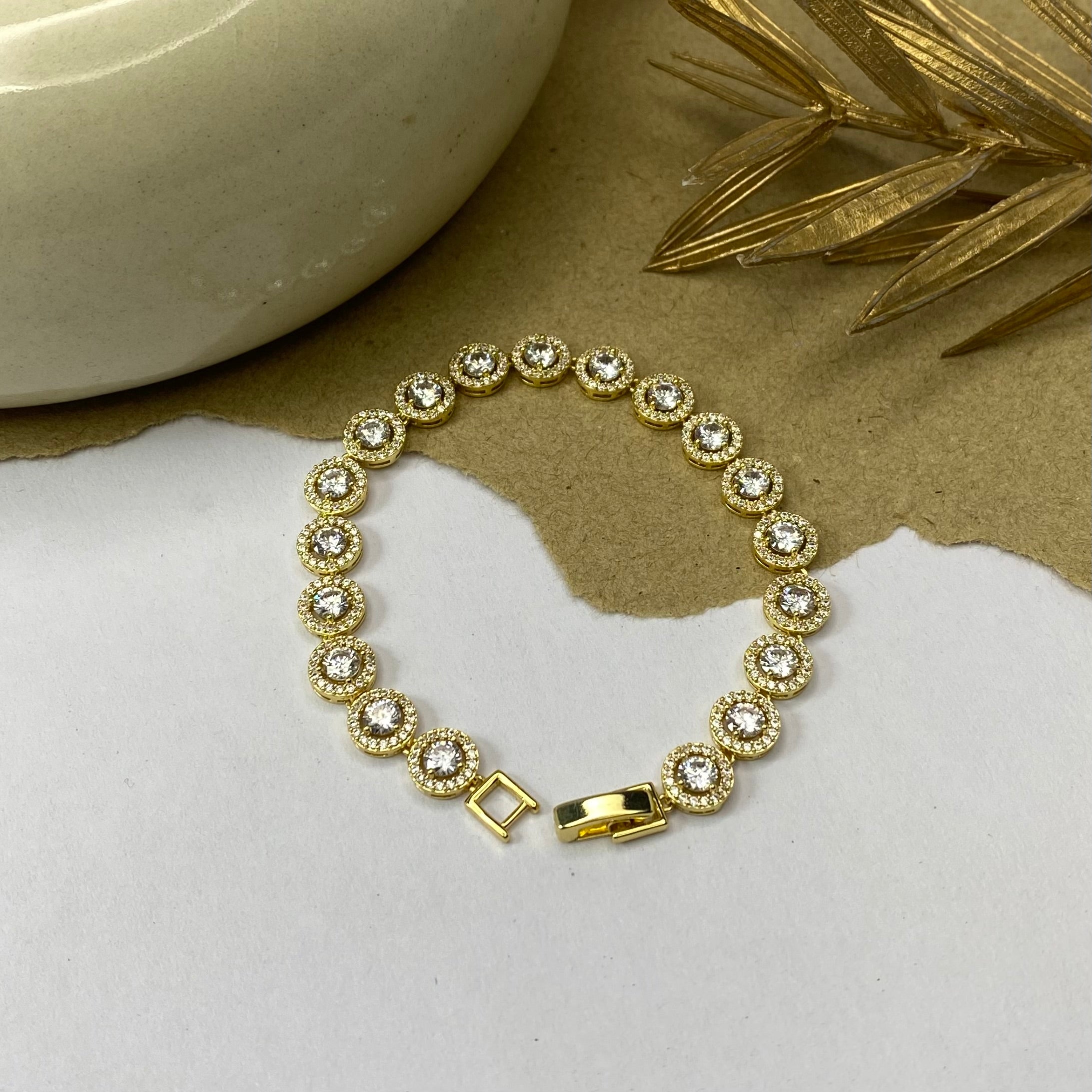 Golden Tennis Bracelet with Solitaire Stones
