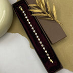 Golden Tennis Bracelet with Solitaire Stones