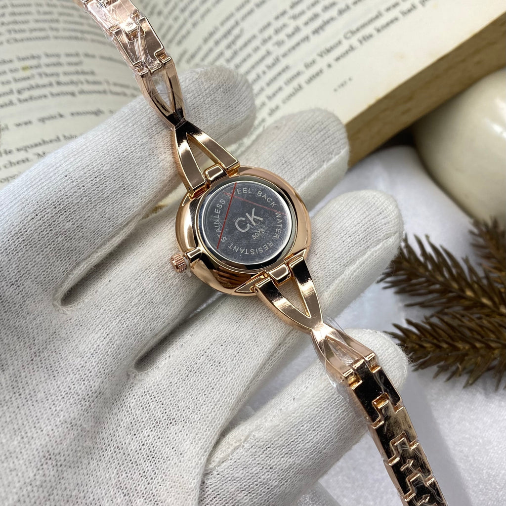 Seductive Bangle Rose Gold Tone Watch (K4E2N61V)
